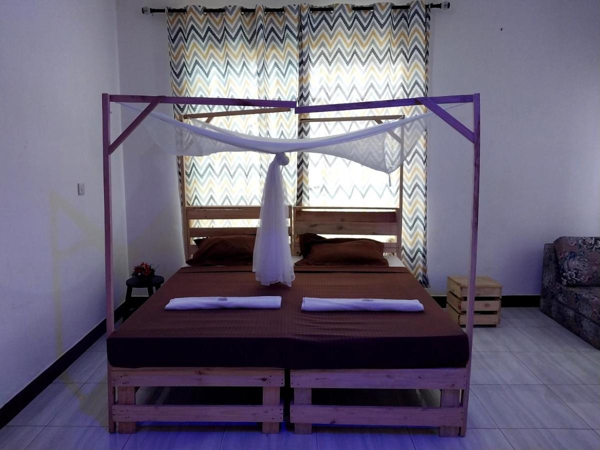 L&J Modern Backpackers Kigamboni Beach House Bed and Breakfast Dar es Salaam Buitenkant foto