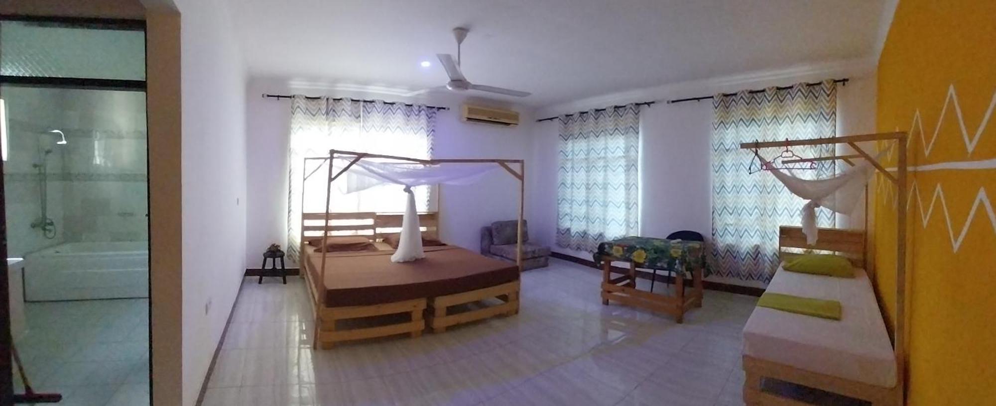 L&J Modern Backpackers Kigamboni Beach House Bed and Breakfast Dar es Salaam Buitenkant foto
